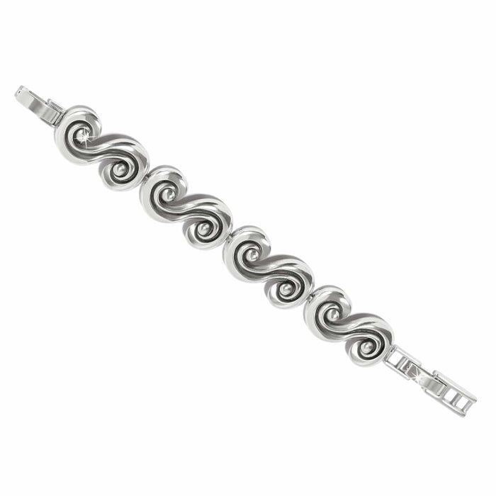 Brighton bracelet with silver-plated swirling scroll links and folding clasp closure on a white background