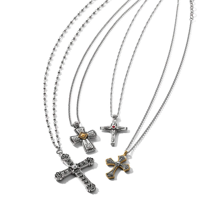 Brighton four cross pendant necklaces in two-tone finish with crystal accents and ornate scrollwork on a white background