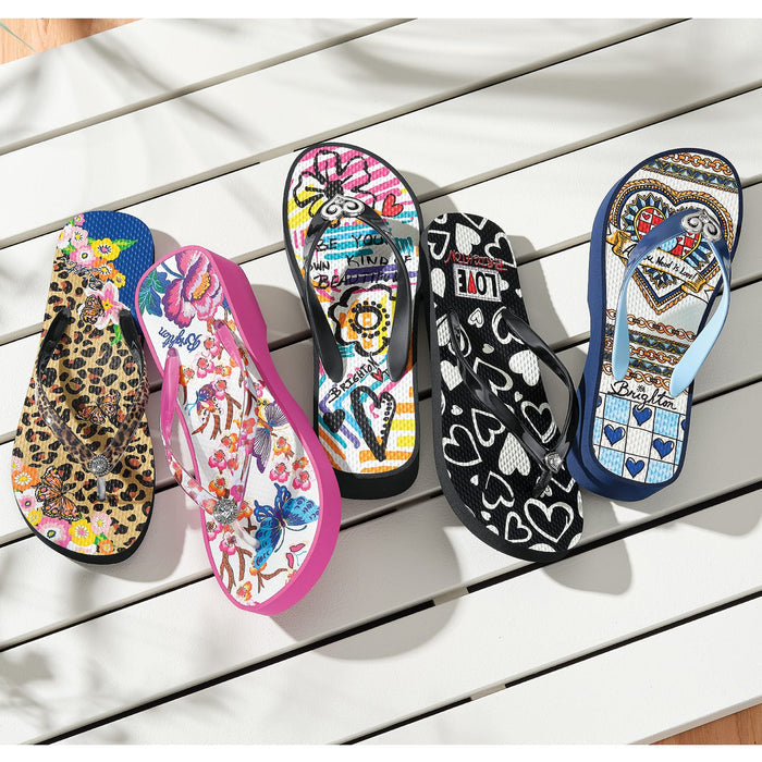 Brighton rubber flip-flop sandals styled in five prints including leopard, floral, hearts, and graphic designs on white slats