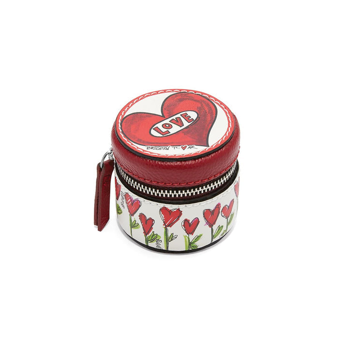 Brighton round leather jewelry case with red heart lid and illustrated heart flower print on a white background