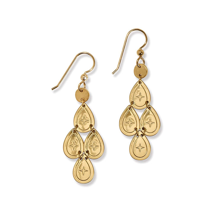 Brighton chandelier drop earrings with gold-plated teardrop charms featuring engraved star motifs on a white background