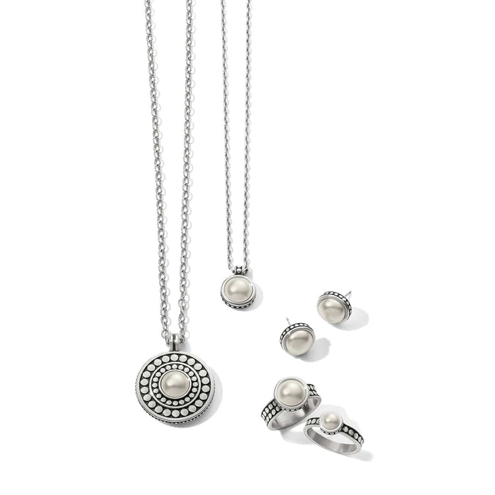 Brighton jewelry set styled with matching pearl pendant necklaces, stud earrings, and rings featuring silver-tone beaded details