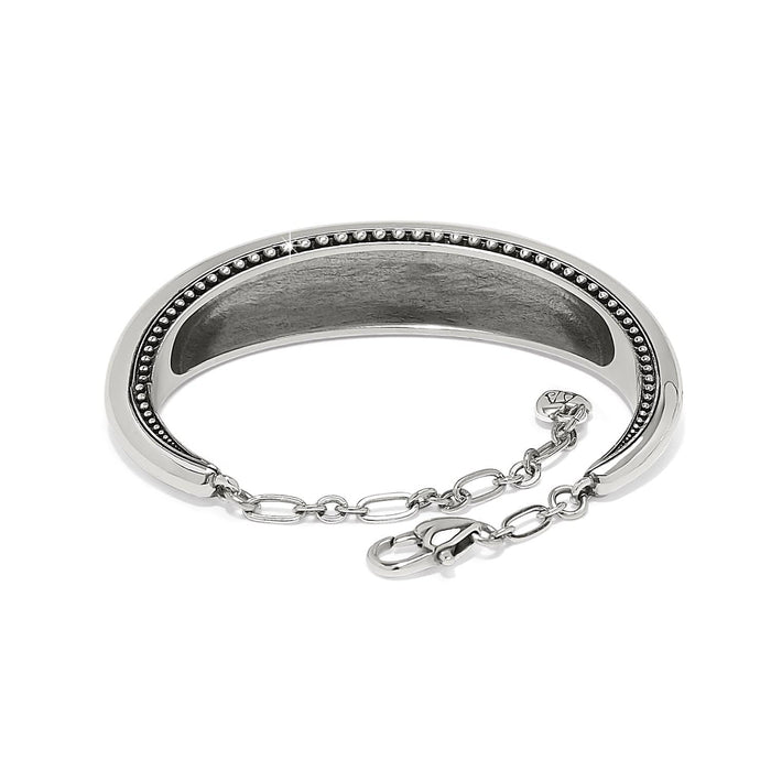 Brighton bangle bracelet shown from the side with silver-plated finish, beaded trim, and chain clasp on a white background