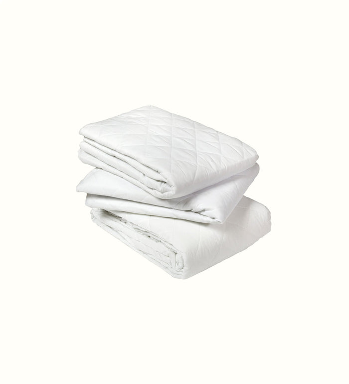 Quilted waterproof mattress protector for elderly care interiors