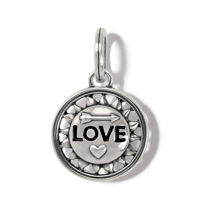 Brighton round charm with LOVE text, arrow, heart motif, and openwork border in silver-tone on a white background