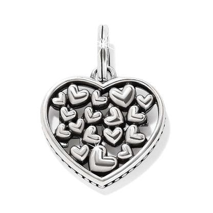Brighton heart charm pendant with cluster of small raised hearts inside silver-tone open frame on a white background