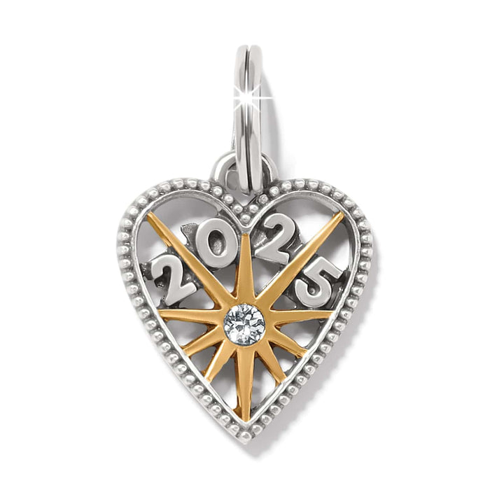 Brighton heart charm with two-tone finish, gold starburst, crystal center, and 2025 numerals on a white background