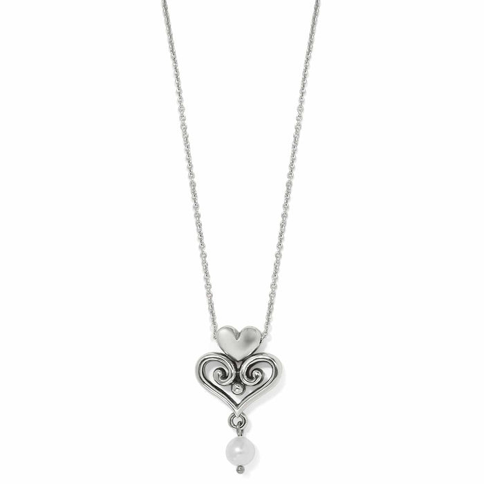 Brighton pendant necklace with silver-plated scrolled heart design and glass pearl drop on a white background