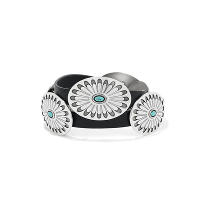 Brighton black leather belt with oval silver-tone concho medallions and turquoise stone centers on a white background