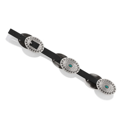 Brighton black leather belt with oval silver-tone concho medallions, turquoise stone centers, and engraved buckle on a white background