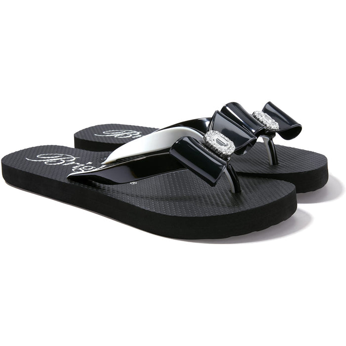 Brighton black rubber flip-flop sandals with glossy bow straps and crystal-accented centerpieces on a white background