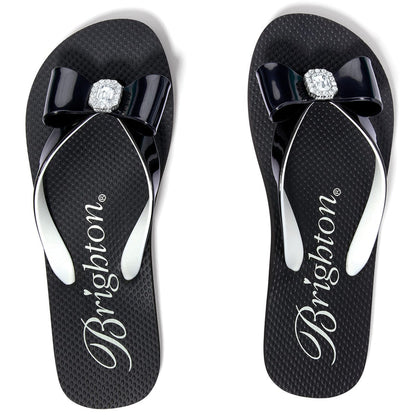 Brighton black rubber flip-flop sandals with navy bow and crystal embellishment on a white background