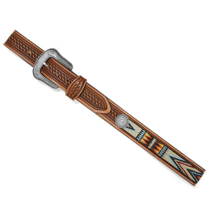 Brighton tooled leather belt with basketweave pattern, woven aztec inlay, silver-tone concho, and engraved buckle on a white background
