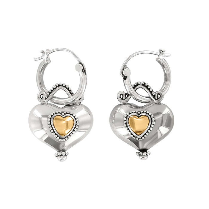 Brighton hoop earrings with sterling silver puffed hearts and gold-plated heart centers with beaded detail on a white background