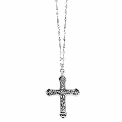 Brighton pendant necklace with silver-plated ornate cross, scroll detailing, central crystal, and beaded chain on a white background