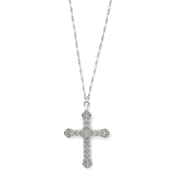Brighton pendant necklace with ornate silver-plated cross featuring scroll and heart engravings on beaded chain on a white background