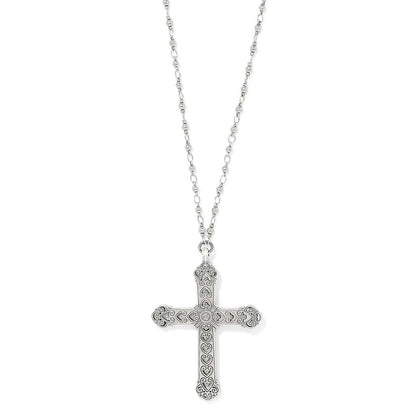 Brighton pendant necklace with ornate silver-plated cross featuring scroll and heart engravings on beaded chain on a white background