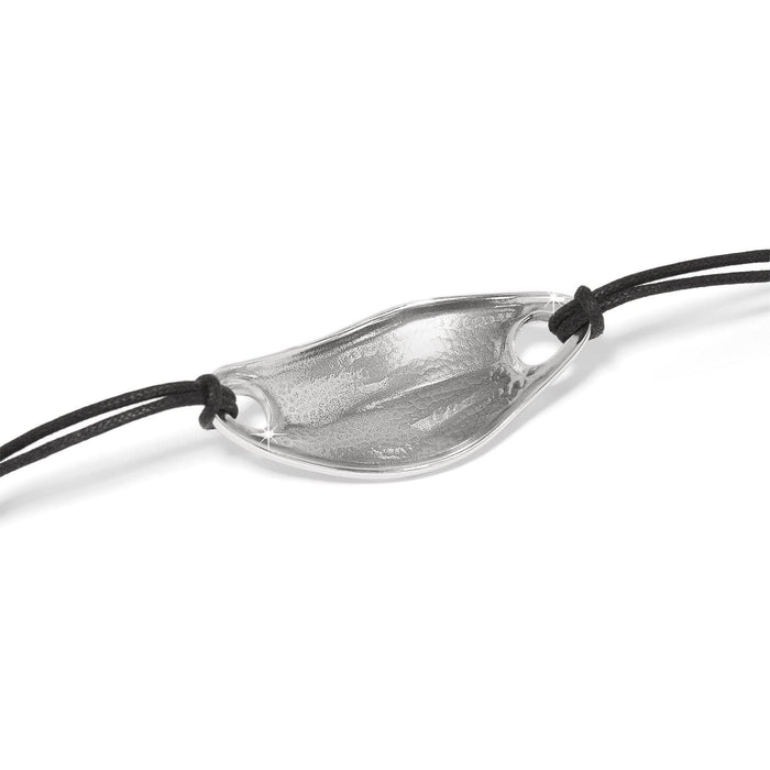 Brighton bracelet with silver-plated wave-shaped centerpiece and adjustable black cord ties on a white background