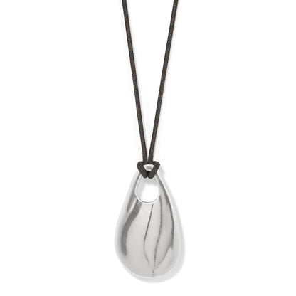 Brighton pendant necklace with silver-plated teardrop pendant and black cord on a white background