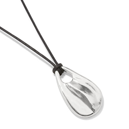 Brighton pendant necklace with silver-plated teardrop pendant on black cord with knotted detail on a white background