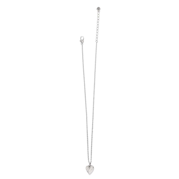 Brighton pendant necklace with small silver-tone heart charm, lobster clasp, and extender chain on a white background