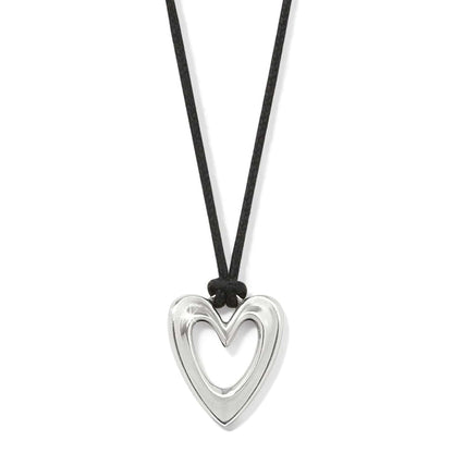 Brighton pendant necklace with silver-plated open heart on a black cord on a white background