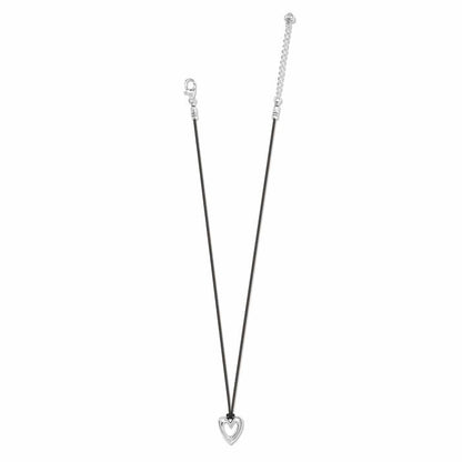 Brighton pendant necklace with black cord, silver-plated open heart pendant, and adjustable extender chain on a white background
