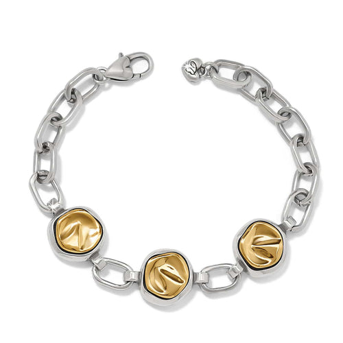 Brighton chain link bracelet with three two-tone gold dimpled discs and silver-tone lobster clasp on a white background