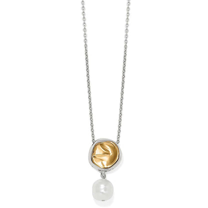 Brighton pendant necklace with two-tone silver and gold medallion and baroque glass pearl drop on a white background