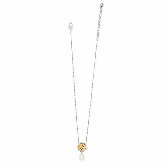 Brighton pendant necklace with two-tone circle accent and barque glass pearl drop on a white background