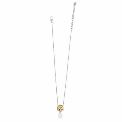 Brighton pendant necklace with two-tone circle accent and barque glass pearl drop on a white background