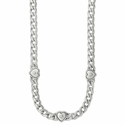 Brighton silver-plated curb chain necklace with three heart stations and crystal accents on a white background