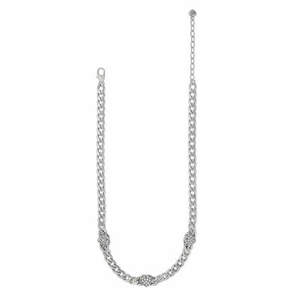 Brighton silver-plated curb chain necklace with three crystal heart stations and lobster clasp on a white background