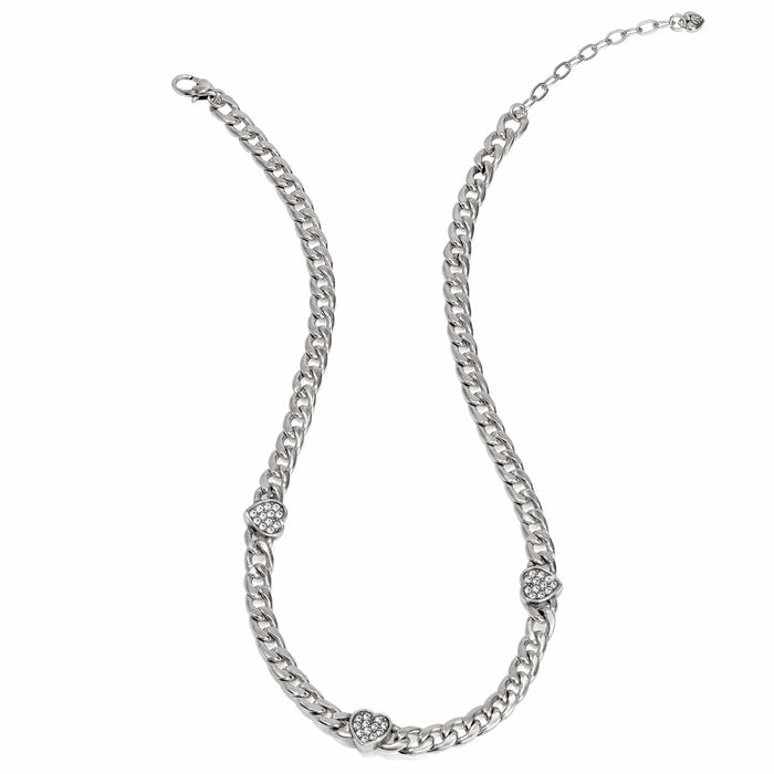 Brighton silver-plated curb chain necklace with three crystal heart stations and adjustable clasp on a white background
