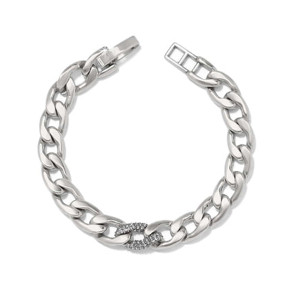 Brighton silver-plated curb chain bracelet with crystal-accented center link and fold-over clasp on a white background