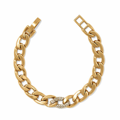 Brighton gold-plated curb chain bracelet with crystal-accented center link and fold-over clasp on a white background