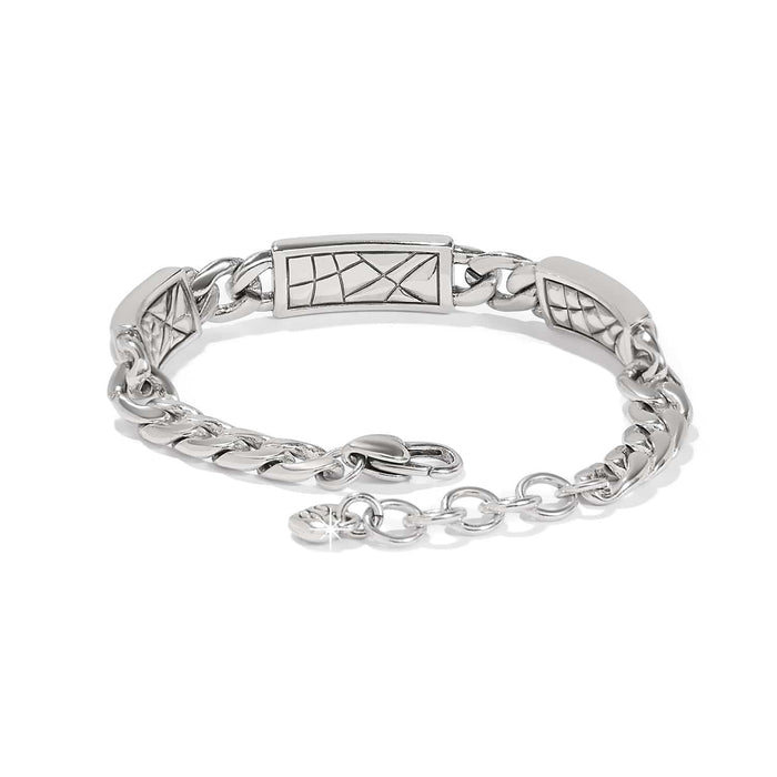 Brighton silver-plated chain bracelet with enamel geometric etched station panels and lobster clasp on a white background