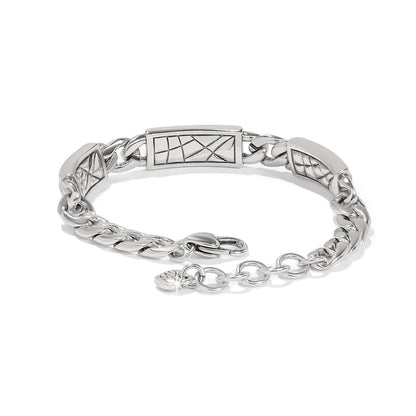 Brighton silver-plated chain bracelet with enamel geometric etched station panels and lobster clasp on a white background