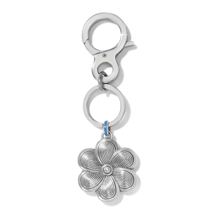 Brighton keychain with silver-tone flower charm, crystal center, blue enamel accent, and lobster clasp on a white background