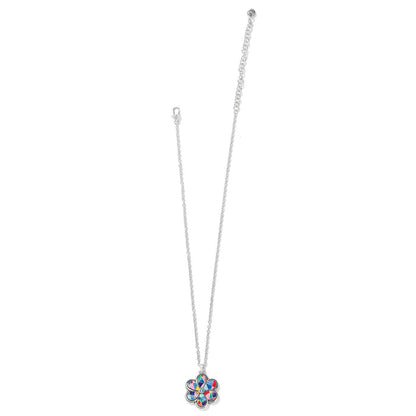 Brighton silver-plated pendant necklace with multicolor enamel flower and crystal center on a white background