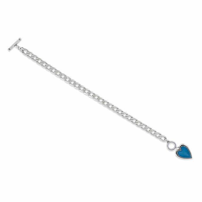 Brighton curb chain bracelet with silver-plated links, toggle clasp, and blue enamel heart charm on a white background