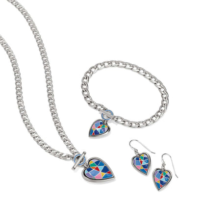 Brighton silver-plated heart jewelry set styled with curb chain necklace, bracelet, and earrings featuring colorful enamel mosaic hearts