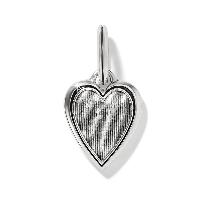 Brighton heart charm with silver-plated frame and ridged textured center on a white background
