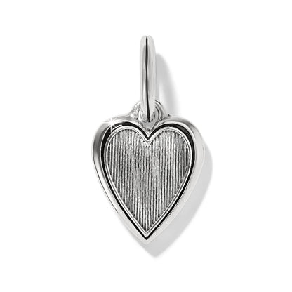 Brighton heart charm with silver-plated frame and ridged textured center on a white background