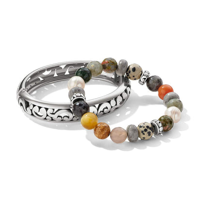 Brighton bangle bracelet with silver-plated scroll design and beaded stretch bracelet with multicolored gemstones on a white background