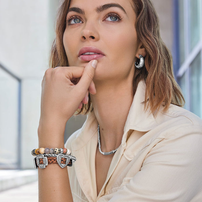 Model wearing Brighton silver-plated hoop earrings with beaded stone bracelets and coordinating Brighton accessories