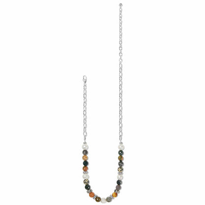Brighton beaded necklace with multicolor stones, glass pearls, and silver-plated chain and accents on a white background