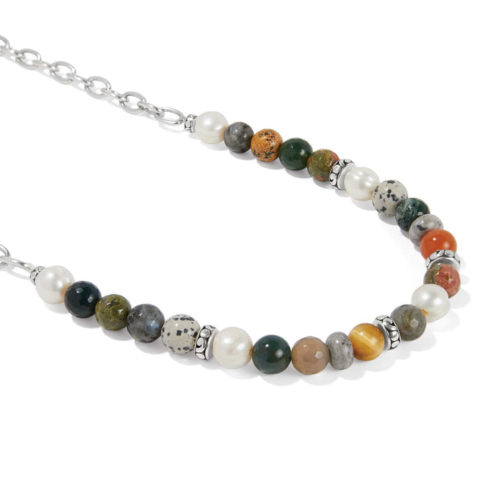 Brighton beaded necklace with glass pearls, multicolor gemstone beads, and silver-plated chain and accents on a white background