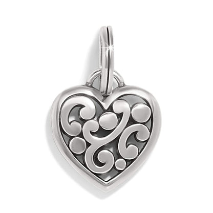 Brighton heart charm with silver-tone scroll and dot openwork design and split ring on a white background