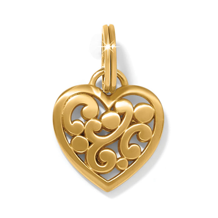 Brighton heart charm with gold-plated finish featuring openwork scroll and dot design with split ring on a white background